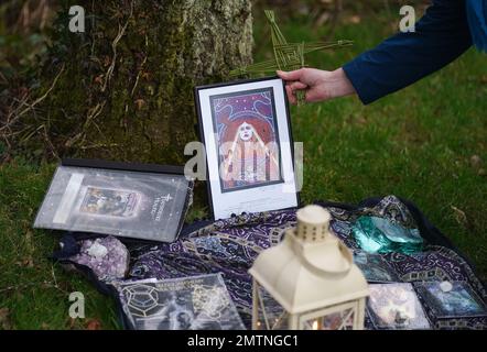 Nora Creed holds a traditional St. Brigid's Cross made from rushes ahead of conducting a ceremony to embrace the devine feminine and honour the saint, at St Brigid's holy well in Co Kildare. February 1st marks St Brigid's Day which is seen by many in Ireland as the first day of Spring. Picture date: Wednesday February 1, 2023. Stock Photo