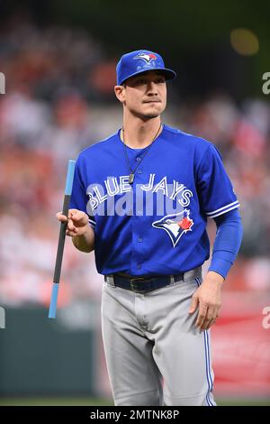 Toronto Blue Jays' Darwin Barney warms up before playing the