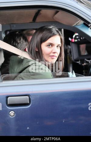 Katie Holmes brings along baby Suri, who seems to be getting bigger every day, as she arrives on the set of her new film 'Son of No One.' Holmes looked to be having a great time on the job as she filmed a scene with Channing Tatum during the shoot in New York, NY. 4/9/10.   . Stock Photo