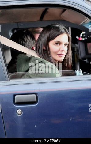 Katie Holmes brings along baby Suri, who seems to be getting bigger every day, as she arrives on the set of her new film 'Son of No One.' Holmes looked to be having a great time on the job as she filmed a scene with Channing Tatum during the shoot in New York, NY. 4/9/10.   . Stock Photo