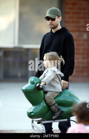 'Spiderman' actor Tobey Maguire spends Valentines Day with wife Jennifer Meyer and daughter Ruby Sweetheart at a Beverly HIlls playground.  Maguire and Meyer are expecting their second child together in the spring of 2009.  Los Angeles, CA. 2/14/09. Stock Photo