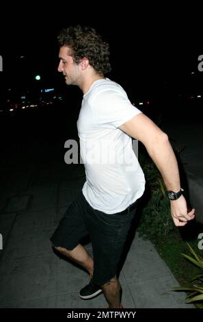 Greek shipping heir and ex-boyfriend of Paris Hilton, Mary-Kate Olsen and Lindsay Lohan Stavros Niarchos heads out to the Crown Bar. He jumps off a high step on his way in making his way around photographers. Los Angeles, CA. 7/2/08. Stock Photo