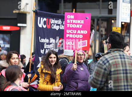 London, UK, 1st February 2023. Families joined striking teachers as they marched through central London to Parliament asking for fair pay. The day has been dubbed Walkout Wednesday as thousands of teachers, train and bus drivers and civil servants carried out strikes. Credit : Monica Wells/Alamy Live News Stock Photo