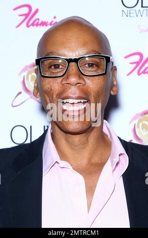 RuPaul at the “Pink Lady” Carpet for the Grand Opening of Olivia Newton John’s “Summer Nights” at the Flamingo. Las Vegas, NV. 11th April 2014. Stock Photo