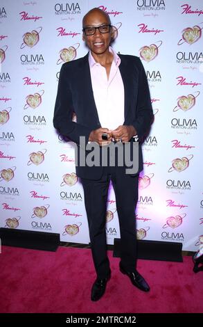 RuPaul at the “Pink Lady” Carpet for the Grand Opening of Olivia Newton John’s “Summer Nights” at the Flamingo. Las Vegas, NV. 11th April 2014. Stock Photo