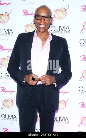 RuPaul at the “Pink Lady” Carpet for the Grand Opening of Olivia Newton John’s “Summer Nights” at the Flamingo. Las Vegas, NV. 11th April 2014. Stock Photo