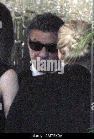 Sylvester Stallone arrives at his son Sage Stallone's funeral. Wearing