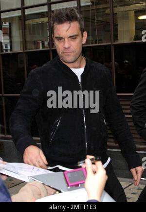 Robbie Williams, 36, Shows Off Some Grey Hair As He Arrives With His ...