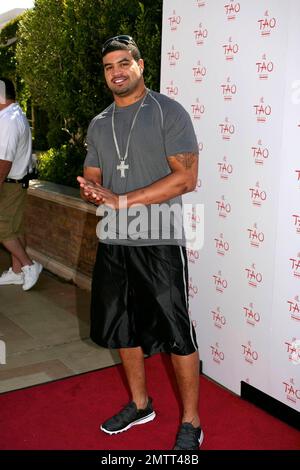 Celebrating the hottest pool party of 2008, Shawn Merriman poses for photographers before enjoying the many amenities that TAO Beach has to offer during the season kick-off at the Venetian. Las Vegas, NV. 4/12/08. Stock Photo