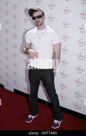 Celebrating the hottest pool party of 2008, Chris Evans poses for photographers before enjoying the many amenities that TAO Beach has to offer during the season kick-off at the Venetian. Las Vegas, NV. 4/12/08. Stock Photo