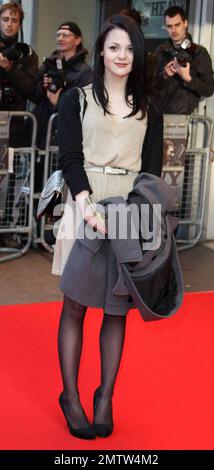 Kathryn Prescott walks the red carpet at the world premiere of 'The Heavy', a thriller directed by Marcus Warren, at Leicester Square. London, UK. 04/15/10. Stock Photo