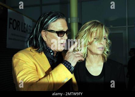 Mickey Rourke and Kim Basinger at 'The Informers' premiere at the Arclight Hollywood. Los Angeles, CA. 4/16/09.   .  . Stock Photo