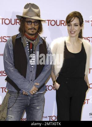 SPAIN OUT - Johnny Depp and Angelina Jolie at the photocall for 'The Tourist' at the Villamagna Hotel in Madrid, Spain. 12/16/10. Stock Photo