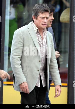 Thomas Haden Church walks with director Cameron Crowe on the location set of 'We Bought a Zoo' in Los Feliz. In the movie, also starring Matt Damon and Scarlett Johansson, a father movies his family to the English countryside to own and operate a zoo. Los Angeles, CA. 1/26/11. Stock Photo