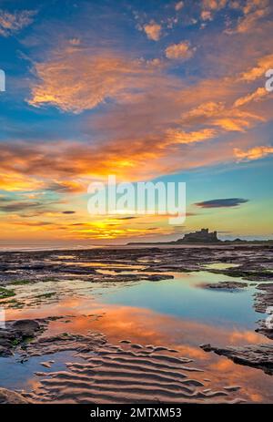 Bamburgh Castle at dawn, Bamburgh, Northumberland, England, United Kingdom Stock Photo