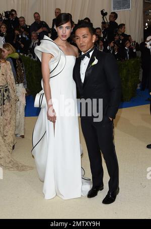 Margaret Qualley left and Prabal Gurung attends The Metropolitan