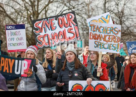 Bristol UK. 01st Feb 2023. Protesters hold placard expressing their