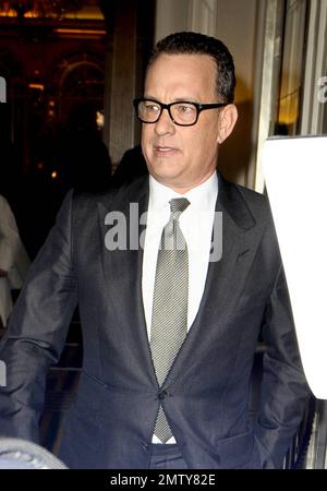 Actor Tom Hanks looks dapper in a black suit as he leaves his luxury hotel. Hanks did his best to keep a low profile as he left, turning away from autograph seekers and photographers. London, UK. 6/6/11. Stock Photo