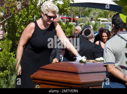 Friends and family mourn the death of legendary actor Tony Curtis during his funeral, which included military honors. Attendees for the services included daughter Jamie Lee Curtis and daughter Annie, wife Jill Curtis, California Governor Arnold Schwarzenegger, former adult film star Ron Jeremy and Phyllis McGuire of The McGuire Sisters. Las Vegas, NV. 10/4/10. Stock Photo