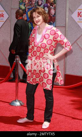 Joan Cusack walks the red carpet at the premiere of 'Toy Story 3' held at El Capitan Theatre.  The third film in the Walt Disney Pictures franchise sees actors Tom Hanks, Tim Allen and Joan Cusack reprise their roles as the familiar characters Woody, Buzz Lightyear and Jessie respectively with director Lee Unkrich (director of 'Monsters, Inc.' and 'Finding Nemo') at the helm.  Los Angeles, CA. 06/13/10. Stock Photo