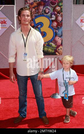 Erik von Detten and nephew Jake walk the red carpet at the premiere of 'Toy Story 3' held at El Capitan Theatre.  The third film in the Walt Disney Pictures franchise sees actors Tom Hanks, Tim Allen and Joan Cusack reprise their roles as the familiar characters Woody, Buzz Lightyear and Jessie respectively with director Lee Unkrich (director of 'Monsters, Inc.' and 'Finding Nemo') at the helm.  Los Angeles, CA. 06/13/10. Stock Photo