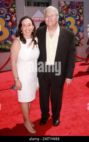 Randy Newman and wife Gretchen Preece walk the red carpet at the premiere of 'Toy Story 3' held at El Capitan Theatre.  The third film in the Walt Disney Pictures franchise sees actors Tom Hanks, Tim Allen and Joan Cusack reprise their roles as the familiar characters Woody, Buzz Lightyear and Jessie respectively with director Lee Unkrich (director of 'Monsters, Inc.' and 'Finding Nemo') at the helm.  Los Angeles, CA. 06/13/10. . Stock Photo
