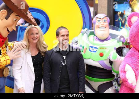 Producer Darla K. Anderson and 'Toy Story 3' director Lee Unkrich walk the multicolor carpet at Empire Leicester Square for the UK premiere of Disney and Pixar's 'Toy Story 3'.  The third installment in the Toy Story series has so far received positive reviews since its June release in North America and has proved popular in the toy and video game world with Mattel, Wii, Xbox 360 and PS3 all creating products based on the lovable film characters. London, UK. 07/18/10. Stock Photo