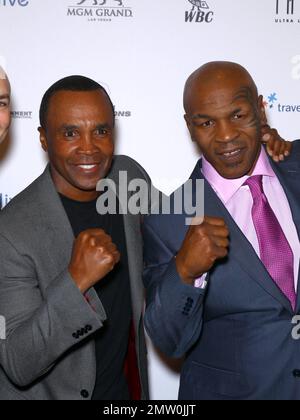 Sugar Ray Leonard and Mike Tyson at the grand opening of Tyson's one-man show 'Mike Tyson: Undisputed Truth - Live on Stage' at the Hollywood Theatre inside the MGM Grand Resort & Casino. Las Vegas, NV. 14th April 2012. Stock Photo