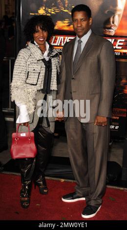 Denzel Washington and Pauletta Washington attend the world premiere of Tony ScottÕs action-thriller 'Unstoppable' at the Regency Village Theater in Westwood, CA. 10/26/10.   . Stock Photo
