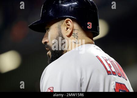 A Major League Baseball tattoo is seen on the neck of Chicago Cubs