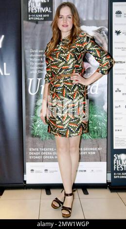 Actress Victoria Thaine arrives for a screening of her film 'The Loved Ones' on the fourth day of the 2010 Sydney Film Festival wearing a unique green patterned dress. Sydney, AU. 06/05/10. Stock Photo