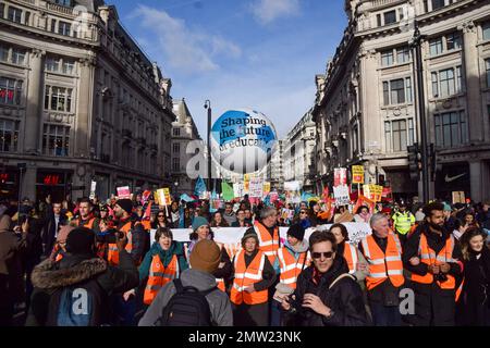 London, UK. 1st February 2023. Protesters in Oxford Circus. Thousands of teachers and supporters marched in central London as teachers across the country begin their strike over pay. The day has seen around half a million people staging walkouts around the UK, including teachers, university staff, public service workers and train drivers. Credit: Vuk Valcic/Alamy Live News. Stock Photo