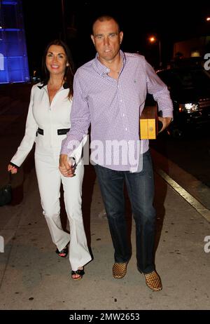 Retired footballer Vinnie Jones along with his wife Tanya Terry were spotted outside of BOA Steakhouse in West Hollywood where they had dined. Los Angeles, CA. 30th August 2012. Stock Photo