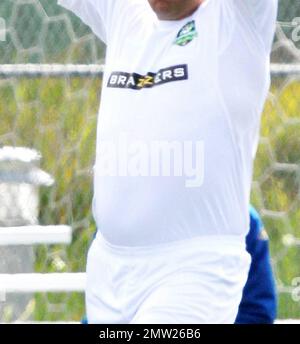 Former professional footballer and actor Vinnie Jones, 46, enjoys his Sunday on a Santa Monica pitch playing soccer with his team Hollywood All Stars Football Club.  Jones, who appears to have put on a bit of weight around his stomach, looked to be having a good time as he kicked the ball around and through it in to the game. Los Angeles, CA. 03/06/11. Stock Photo