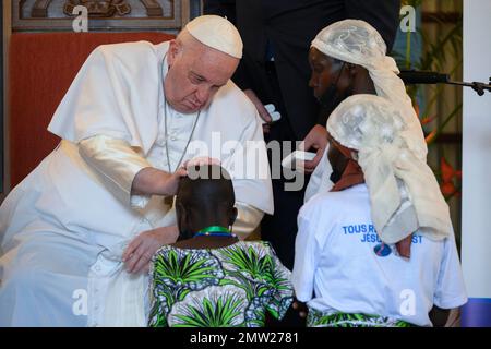 Kinshasa, Gongo. 01st Feb, 2023. Italy, Congo, 2023/2/1. Victims of violence in eastern Congo cheer as they attend a meeting with Pope Francis, at the Apostolic Nunciature in Kinshasa, Democratic Republic of Congo Photograph by Vatican Media/Catholic Press Photo. RESTRICTED TO EDITORIAL USE - NO MARKETING - NO ADVERTISING CAMPAIGNS Credit: Independent Photo Agency/Alamy Live News Stock Photo