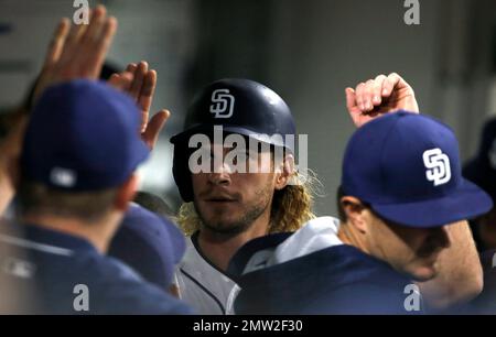 San Diego Padres players congratulate one another after the Padres defeated  the Arizona Diamondbacks 7-0 in a baseball game Saturday, April 3, 2021, in  San Diego. (AP Photo/Denis Poroy Stock Photo - Alamy