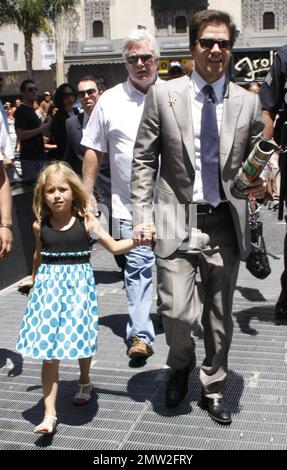 Mark Wahlberg holds daughter Ella Rae's hand as they arrive at Hollywood Boulevard where Wahlberg received a star on the Hollywood Walk of Fame. The actor and producer was joined by his wife Rhea Durham and their four children Ella Rae, Michael, Brendan and Grace.  Los Angeles, CA. 07/29/10. Stock Photo