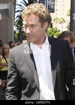 Actor Will Ferrell signs autographs, shakes hands with fans and smiles for the camera as he arrives at Hollywood Boulevard where actor and producer Mark Wahlberg received a star on the Hollywood Walk of Fame. Ferrell spoke at the event and introduced Wahlberg, his 'The Other Guys' co-star.  Los Angeles, CA. 07/29/10. Stock Photo