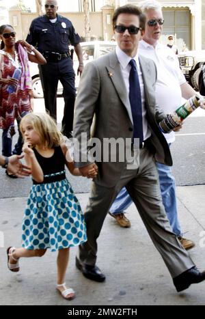 Mark Wahlberg holds daughter Ella Rae's hand as they arrive at Hollywood Boulevard where Wahlberg received a star on the Hollywood Walk of Fame. The actor and producer was joined by his wife Rhea Durham and their four children Ella Rae, Michael, Brendan and Grace.  Los Angeles, CA. 07/29/10.    . Stock Photo