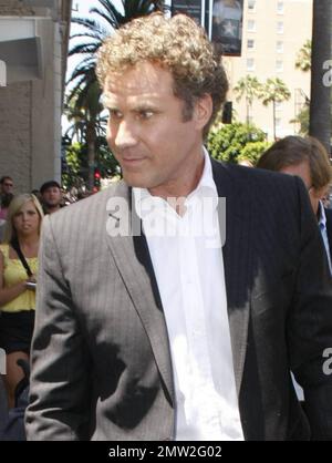 Actor Will Ferrell signs autographs, shakes hands with fans and smiles for the camera as he arrives at Hollywood Boulevard where actor and producer Mark Wahlberg received a star on the Hollywood Walk of Fame. Ferrell spoke at the event and introduced Wahlberg, his 'The Other Guys' co-star.  Los Angeles, CA. 07/29/10.    . Stock Photo