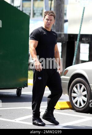 Mark Wahlberg films scenes on the set of his new movie 'Pain and Gain' on the streets of Miami, FL. 16th April 2012. Stock Photo