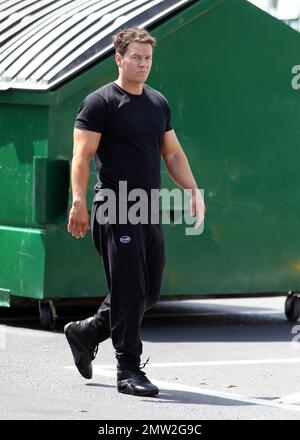 Mark Wahlberg films scenes on the set of his new movie 'Pain and Gain' on the streets of Miami, FL. 16th April 2012. Stock Photo