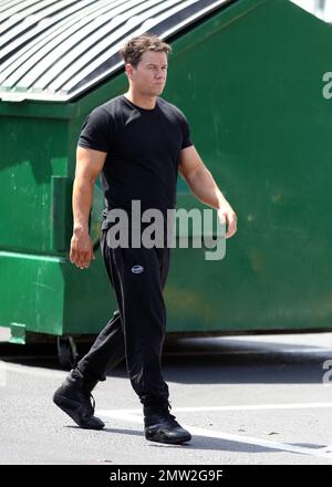 Mark Wahlberg films scenes on the set of his new movie 'Pain and Gain' on the streets of Miami, FL. 16th April 2012. Stock Photo