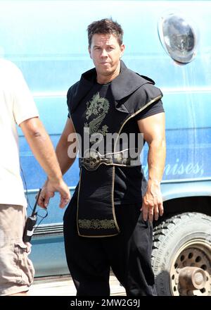 Mark Wahlberg films scenes on the set of his new movie 'Pain and Gain' on the streets of Miami, FL. 16th April 2012. Stock Photo