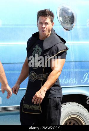 Mark Wahlberg films scenes on the set of his new movie 'Pain and Gain' on the streets of Miami, FL. 16th April 2012. Stock Photo