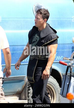 Mark Wahlberg films scenes on the set of his new movie 'Pain and Gain' on the streets of Miami, FL. 16th April 2012. Stock Photo