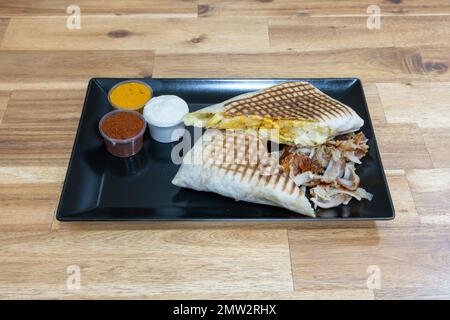 Mexican dishe culinary Still Life. Tacos Kebab with grilled lamb and spicy sauce Stock Photo