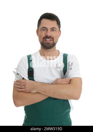 Portrait of professional auto mechanic with wrenches on white background Stock Photo