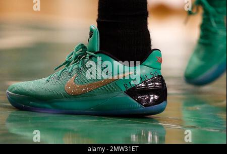 Boston Celtics' Isaiah Thomas wears a message on his shoes in memory of his  sister Chyna during the fourth quarter of a first-round NBA playoff  basketball game against the Chicago Bulls Sunday, April 16, 2017, in  Boston. The Bulls won 106-102. (AP ...