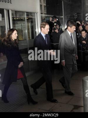 Soon to be wed couple Prince William and Kate Middleton arrive at and later leave the New Zealand High Commission with Prince Harry where they signed a book of condolences to honor those who died in the Christchurch earthquake.  The couple made their stop after arriving back in London from their trip to St Andrews University, where they originally met, in Scotland where they celebrated the school's 600th anniversary celebrations. London, UK. 02/25/11. Stock Photo